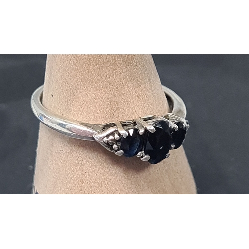 571 - 925 Silver ring 3 black gemstone setting. Size P.