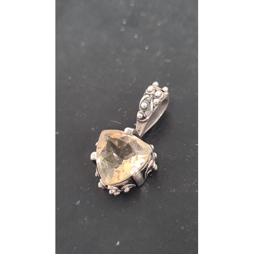 577 - 925 Silver and citrine coloured faceted stone