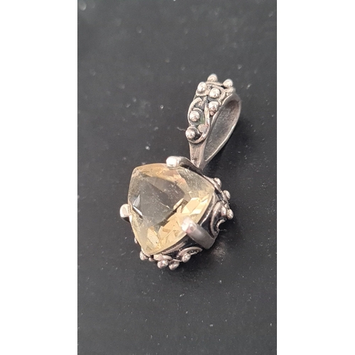 577 - 925 Silver and citrine coloured faceted stone