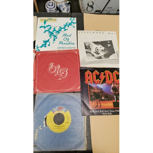 543 - Collection of 45s mainly rock vinyl singles, including Rolling Stones,  ACDC etc Mixed condition