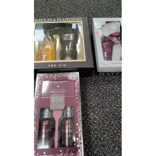 578 - Baylis and Harding gift sets, one male black pepper set and one ladies socks and foot lotion set and... 