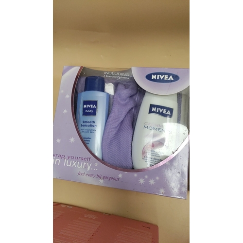 580 - Five ladies and mens gift sets to include Impulse, Nivea, Umbro elite x and Superdry