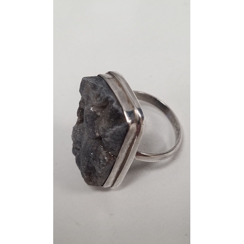 597 - 925 Silver ring with large grey statement gemstone. Size O