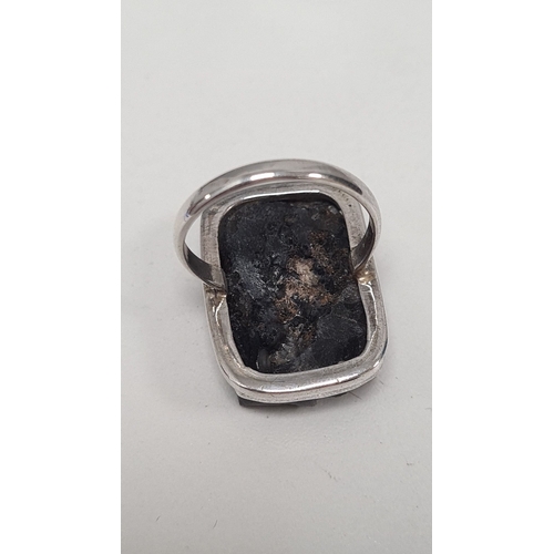 597 - 925 Silver ring with large grey statement gemstone. Size O