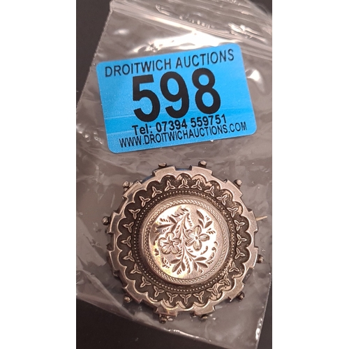 598 - Victorian white metal mourning brooch with floral design