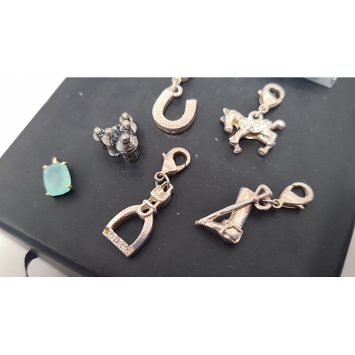 600 - Selection of white metal charms, including horse related charms