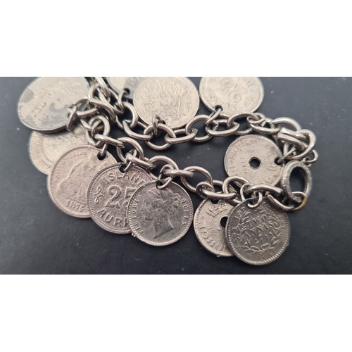 601 - White metal mixed coin bracelet. 6cm diameter