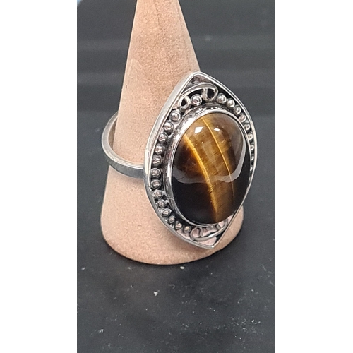 603 - 925 silver statement ring with tiger eye stone.  Adjustable