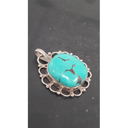 607 - 925 silver pendant with turquoise stone.