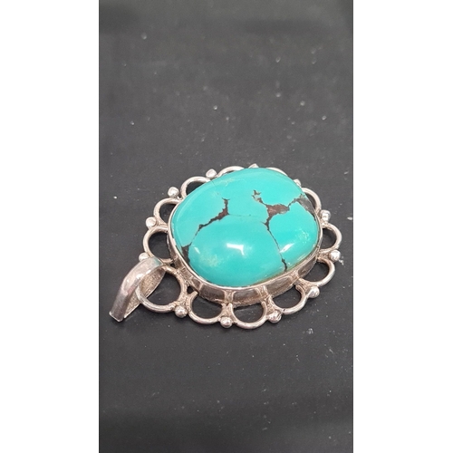 607 - 925 silver pendant with turquoise stone.