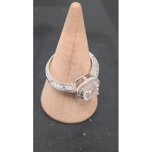 616 - 925 Silver clear gemstone ring. Size L