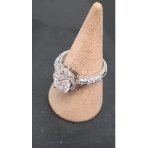 616 - 925 Silver clear gemstone ring. Size L