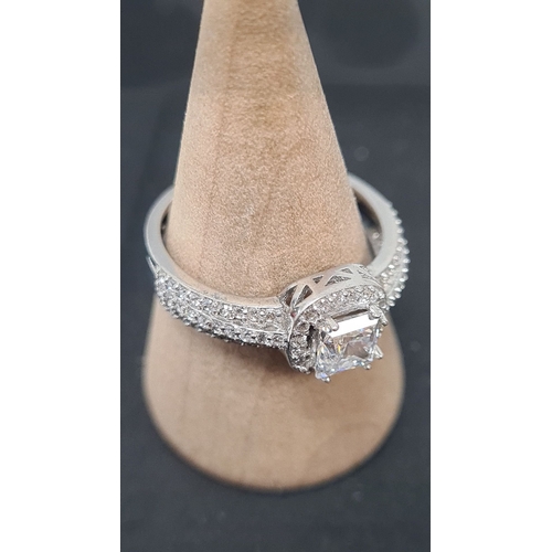 620 - 925 Silver clear stone ring. Size O