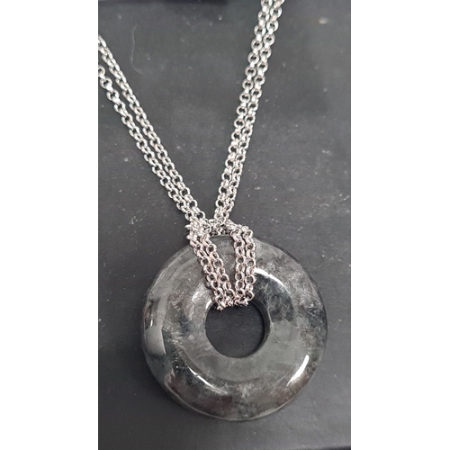 624 - 925 silver chain with circular black stone pendant. 44cm