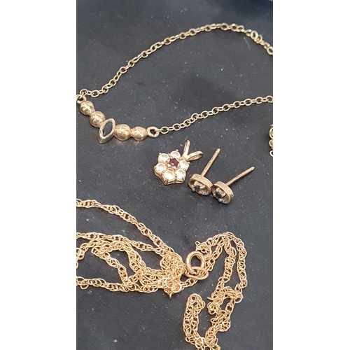 636 - 9ct gold necklaces x 2 with pendants and a pair of 9ct gold earrings weight 4.88 gms