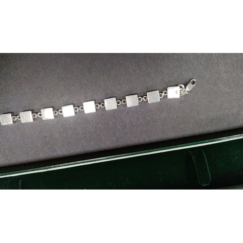 638 - Designer silver bracelet 19cm long