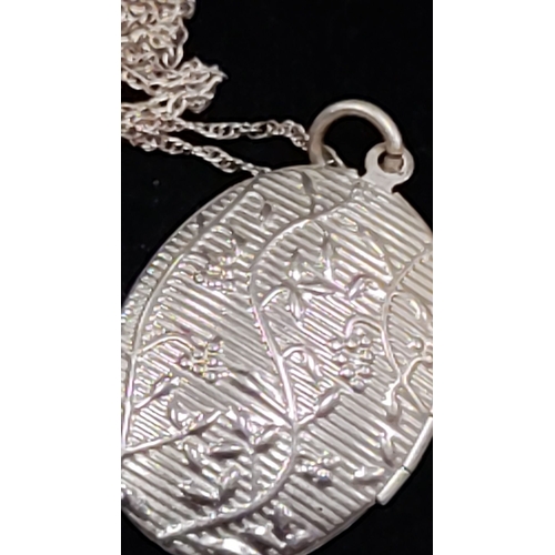 644 - 925 silver locket on silver chain 45cm long