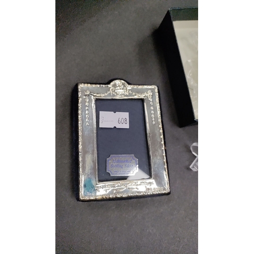 663 - New in box hallmarked silver picture frame 6cm x 8cm