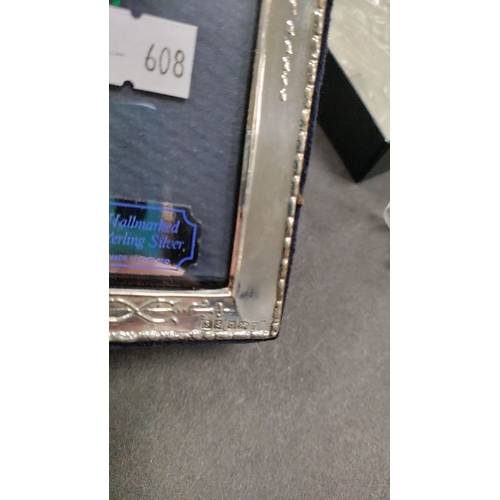 663 - New in box hallmarked silver picture frame 6cm x 8cm