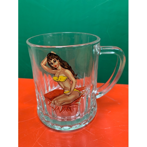 9 - Collection of beer memorabilia, a German police tankard, an erotic lady beer glass and a East Africa... 