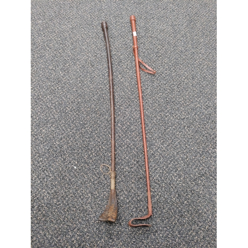 20 - A pair of vintage riding crop/whip AF