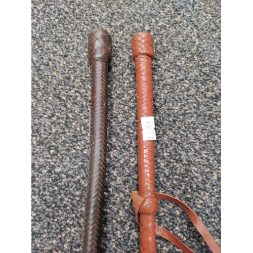 20 - A pair of vintage riding crop/whip AF