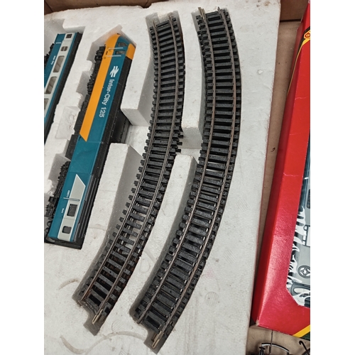 64 - Boxed Hornby oo gauge track and inter City toy trains and carriages with R911 power unit