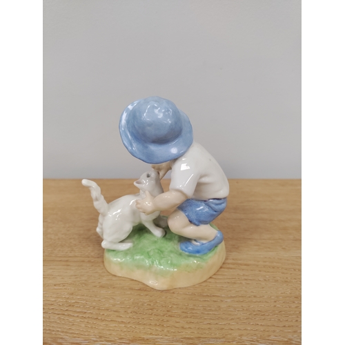 88 - Royal Worcester boy with cat figurine. Modelled by F.C Doughty