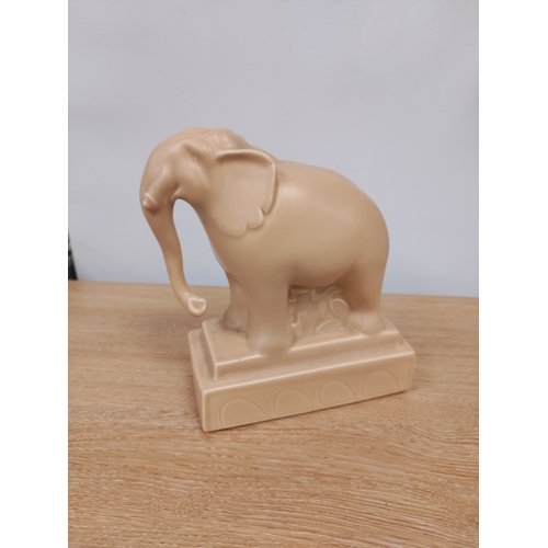 104 - Poole Pottery Elephant. H 18cm x 16cm