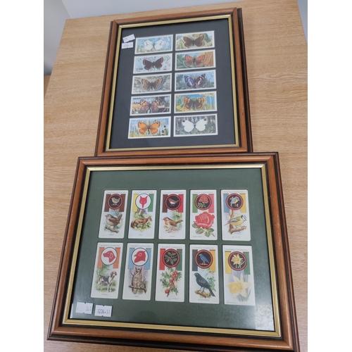 106 - A binder full of cigarette cards and two frames of cigarette cards