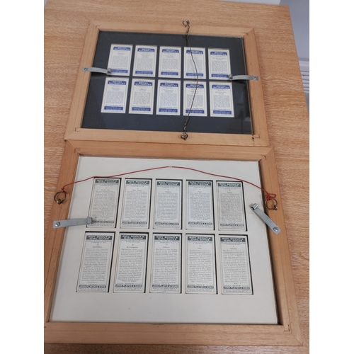 106 - A binder full of cigarette cards and two frames of cigarette cards