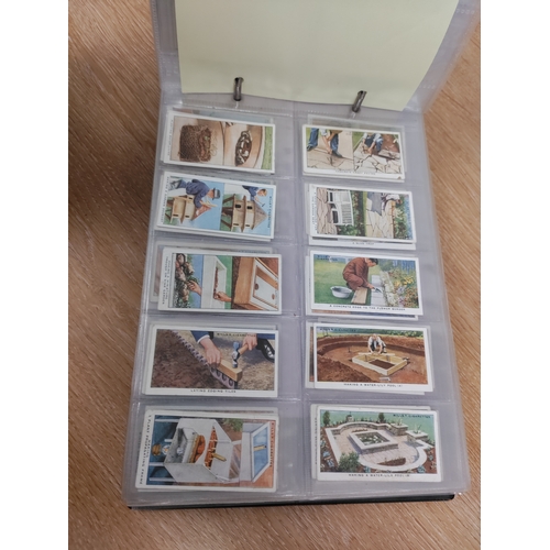 106 - A binder full of cigarette cards and two frames of cigarette cards