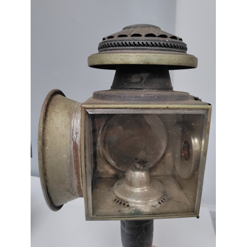 114 - A vintage midland railway hand lamp and an antique stagecoach lamp