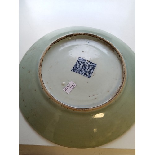 120 - 19th Century Chinese porcelain celadon plate signed. Measures 25.5cm diameter