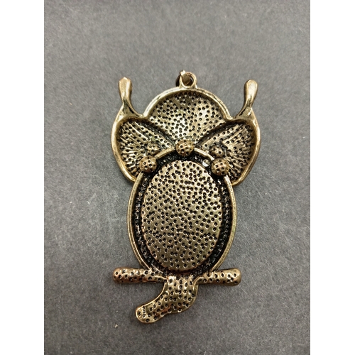 13 - Large yellow metal owl pendant H 7cm