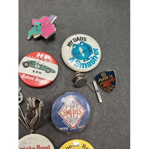 42 - Job lot of vintage badges and pin badges includes royal mint, pg tips, Brooke bond, smiths crisps, e... 