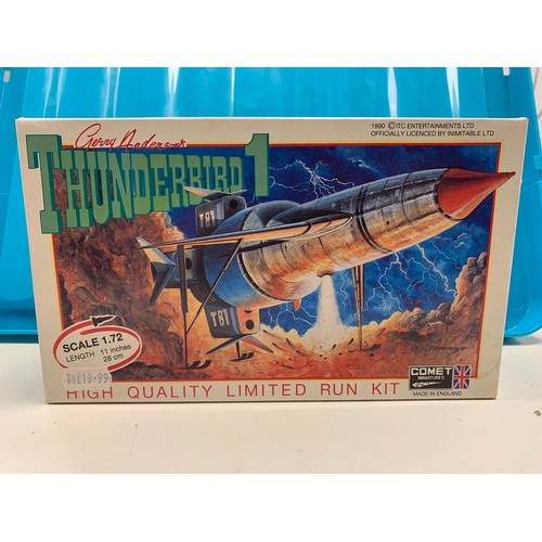 94 - A model of Thunderbird 1 and a die cast model Ford 6600 tractor. 

The Thunderbird 1 model is a 1:72... 