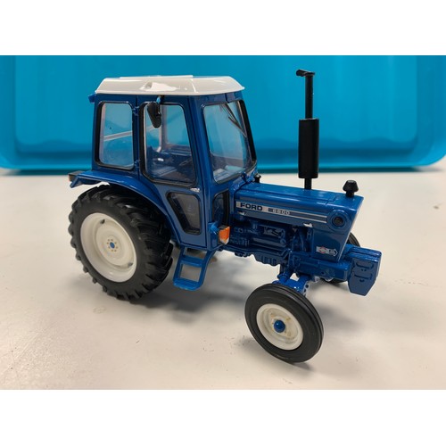 94 - A model of Thunderbird 1 and a die cast model Ford 6600 tractor. 

The Thunderbird 1 model is a 1:72... 