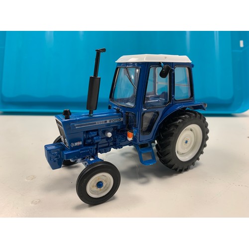 94 - A model of Thunderbird 1 and a die cast model Ford 6600 tractor. 

The Thunderbird 1 model is a 1:72... 