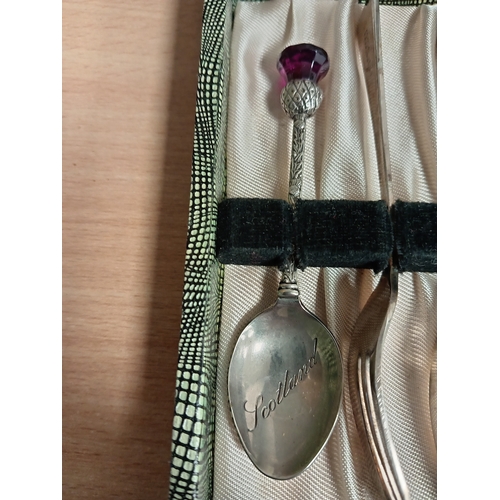 98 - Silver plated boxed desert forks x 5 and a silver plated Scotland thistle teaspoon