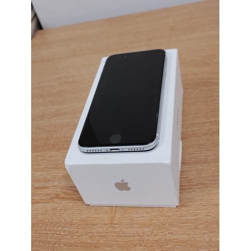 103 - Iphone SE 64GB in original box with charger cleared, logged out and ready to use