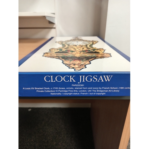 132 - Clock jigsaw of A Louis xv bracket clock, c1745. Contains 1000 pieces, glue, clock mechanism and ins... 