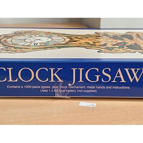 132 - Clock jigsaw of A Louis xv bracket clock, c1745. Contains 1000 pieces, glue, clock mechanism and ins... 