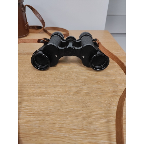 144 - Selfridges binoculars with case