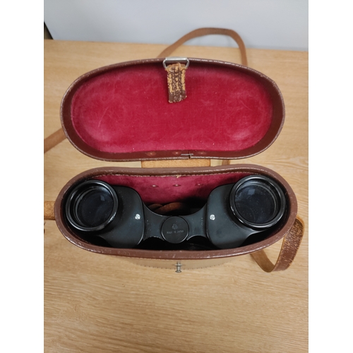 144 - Selfridges binoculars with case