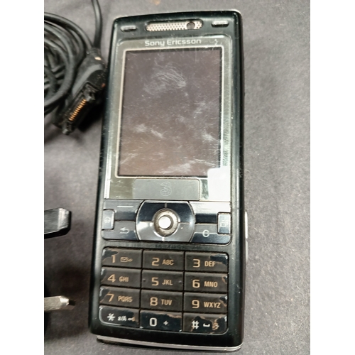 11 - Vintage Sony Ericsson k800i mobile phone and charger