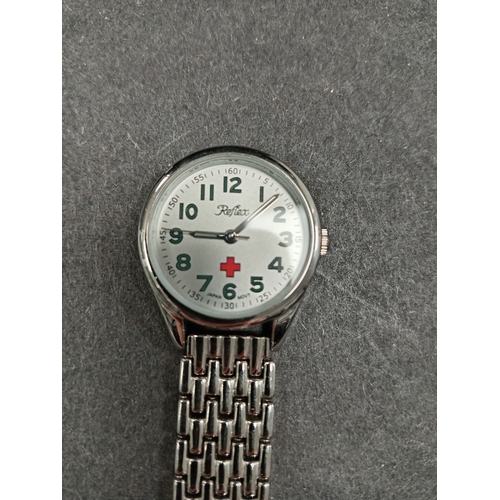 13 - Nurse's vintage Reflex brooch watch