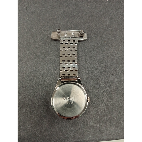 13 - Nurse's vintage Reflex brooch watch