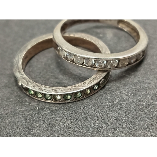 52 - 925 silver pair of diamanté stone band rings Sizes Q and R