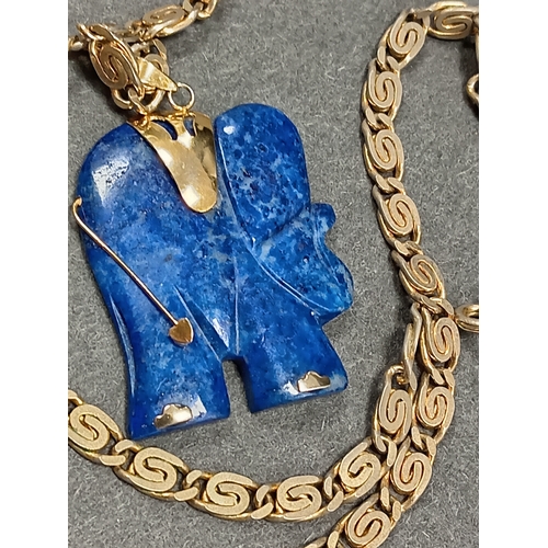 54 - Lapis lazuli Elephant pendant 3.5cm on a yellow metal chain 46cm